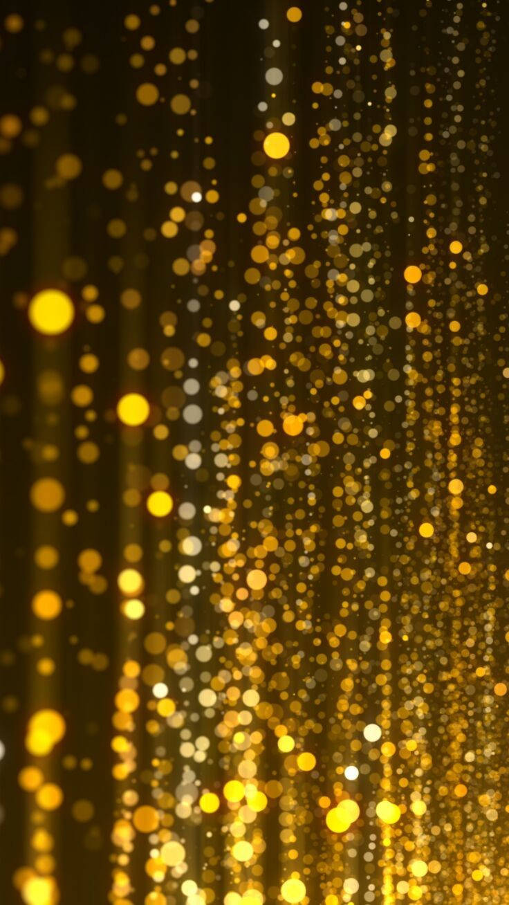 Sparkle 桌布 壁紙 — 金色散景燈光像閃閃發光的雨點般在黑暗背景下層層疊落，營造出奢華閃爍的效果。