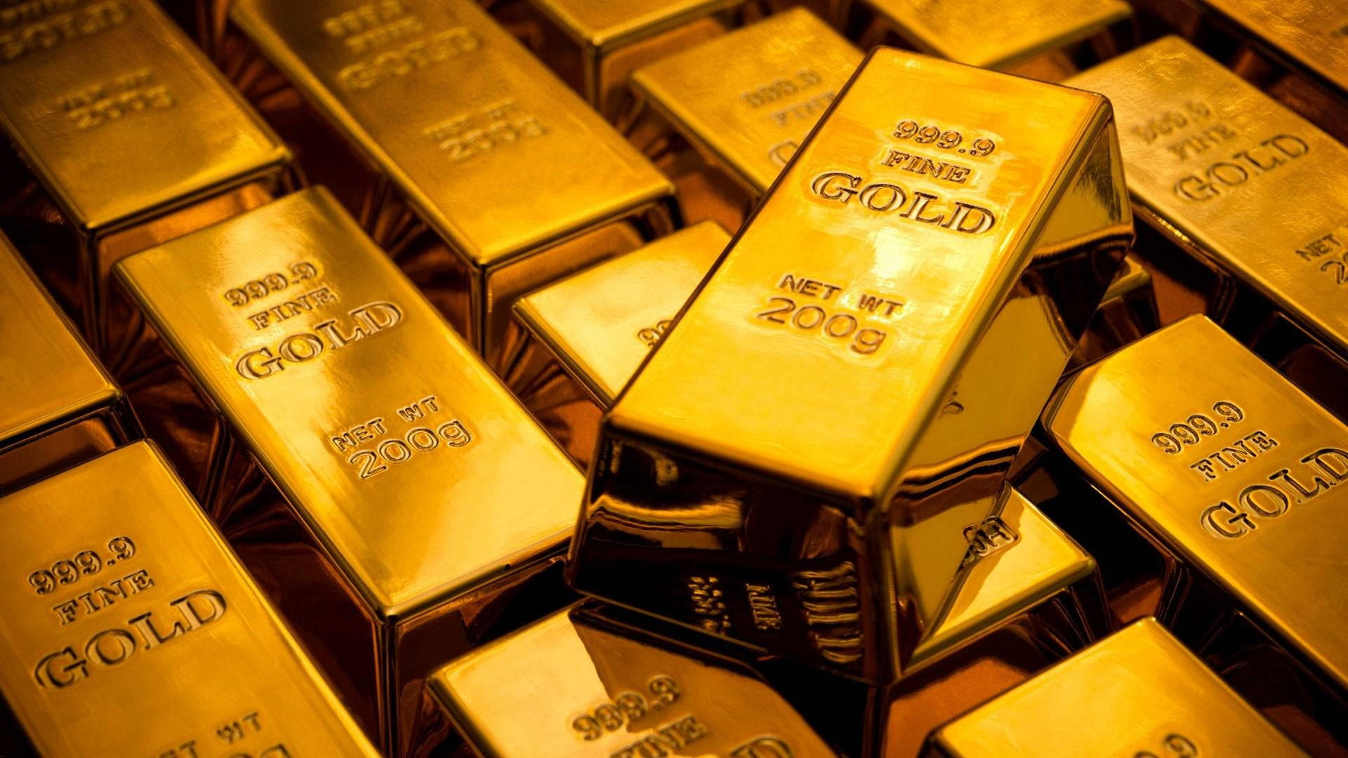 一堆純金條，標示純度999.9及每條200克。