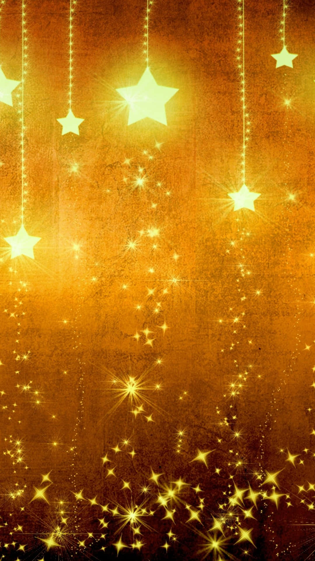 Yellow Galaxy 桌布 壁紙 — 金色星星如閃爍的雨點般傾瀉而下，映襯著質感豐富的琥珀色背景，散發出節日的溫暖光芒。