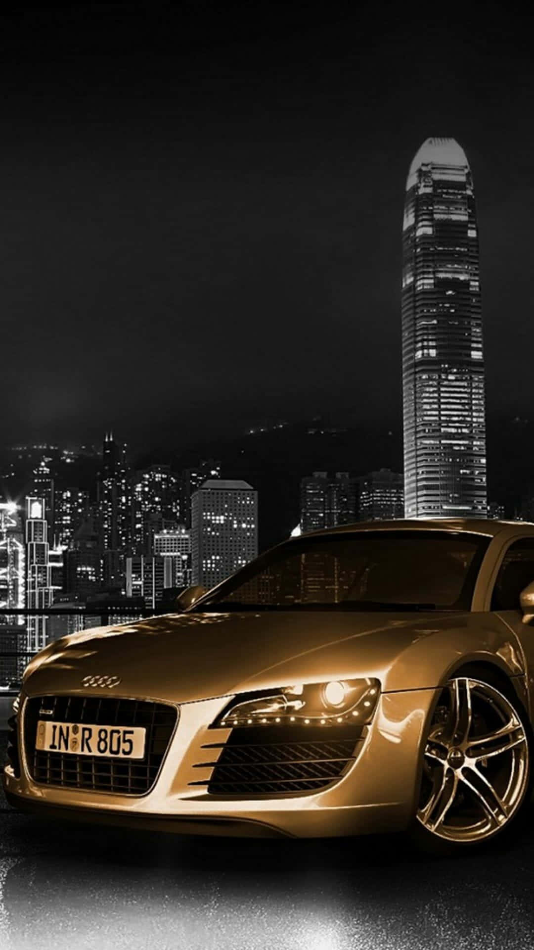 金色汽車與摩天大樓 壁紙