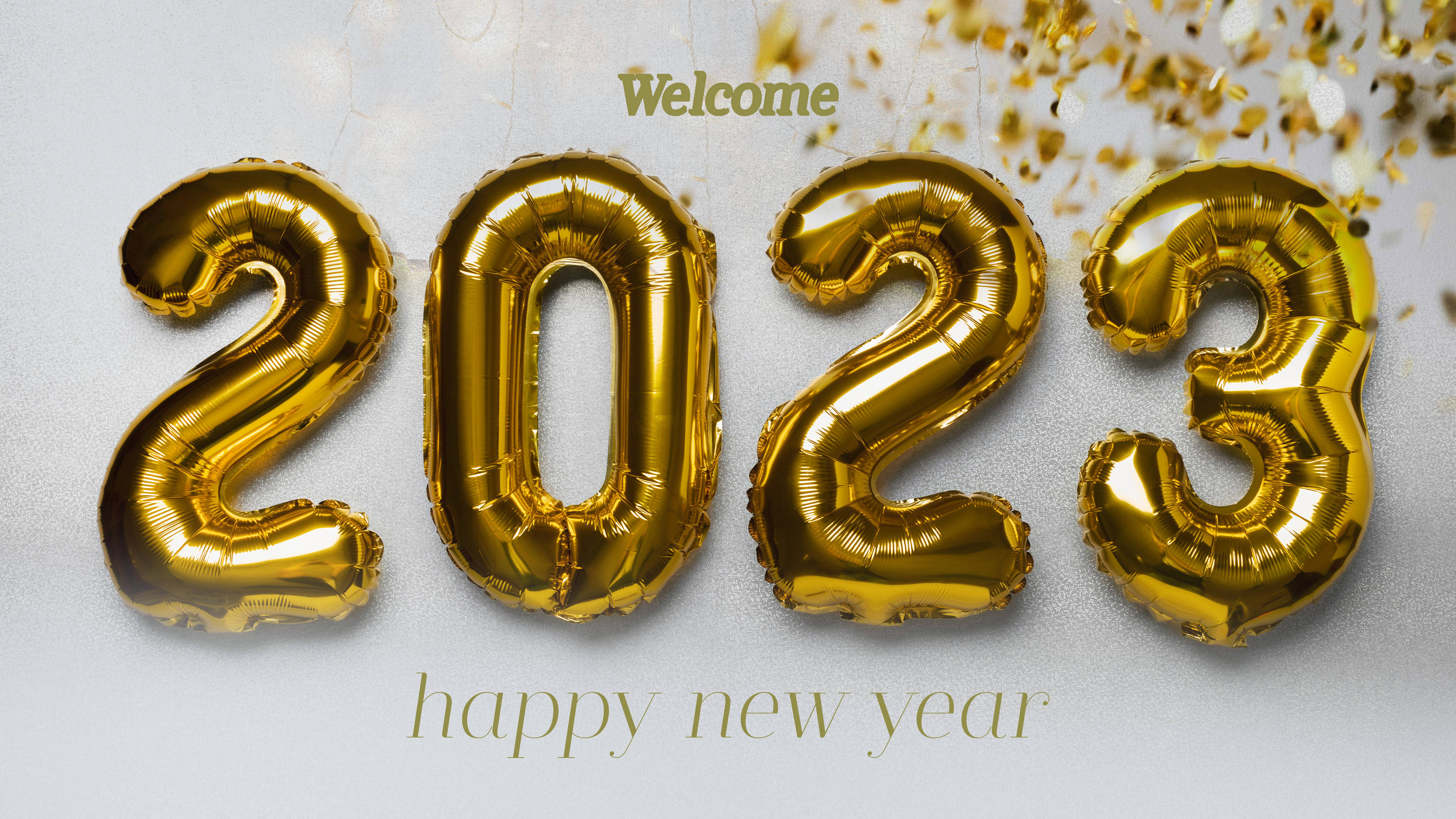 金色2023氣球，帶有五彩紙屑和歡迎新年快樂文字。 — 新年快樂 GIF 壁紙