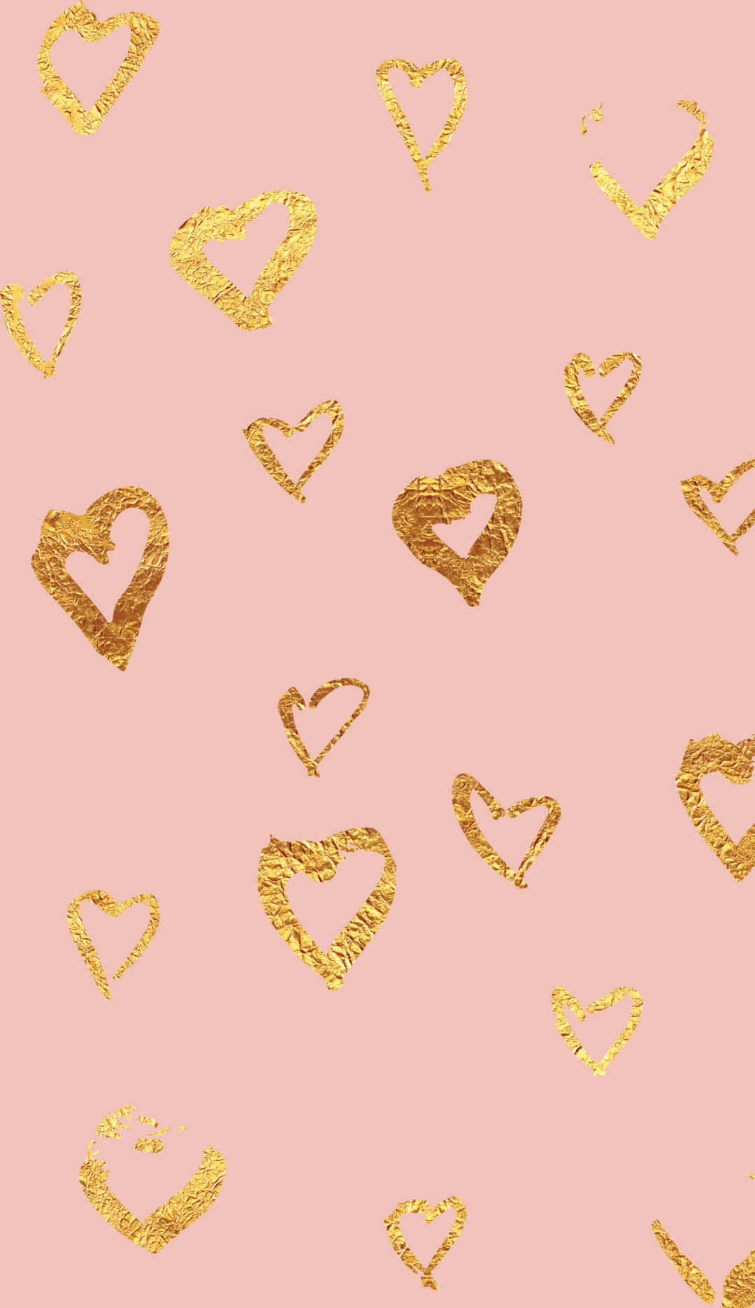 Yellow Heart 桌布 壁紙 — 金色紋理心形在柔和的粉紅色背景上散落，形成浪漫圖案。
