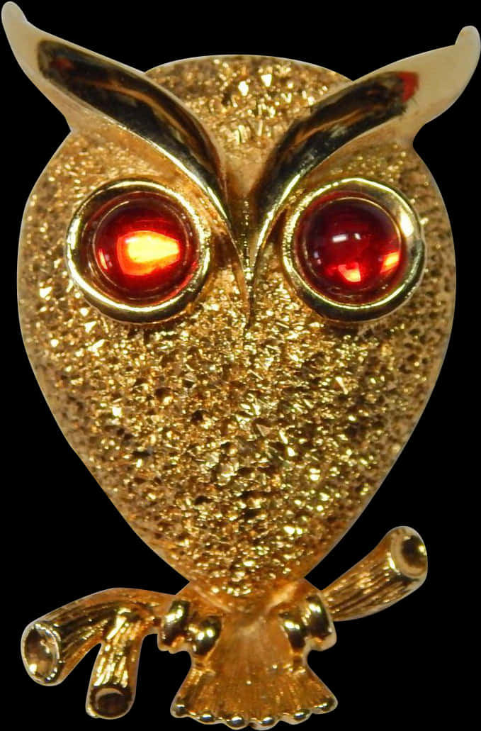 金色貓頭鷹胸針配紅眼 壁紙