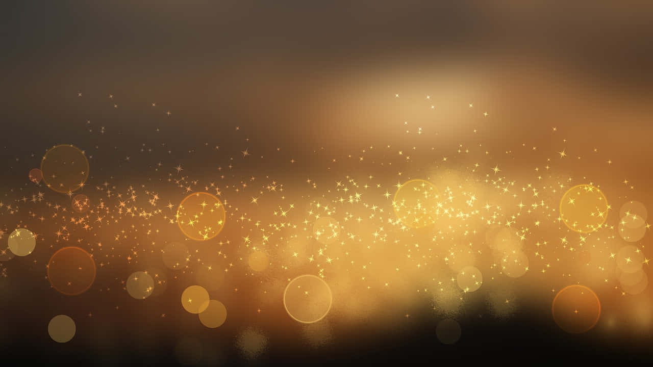 金色閃光和柔和光線在溫暖的抽象背景中閃爍。