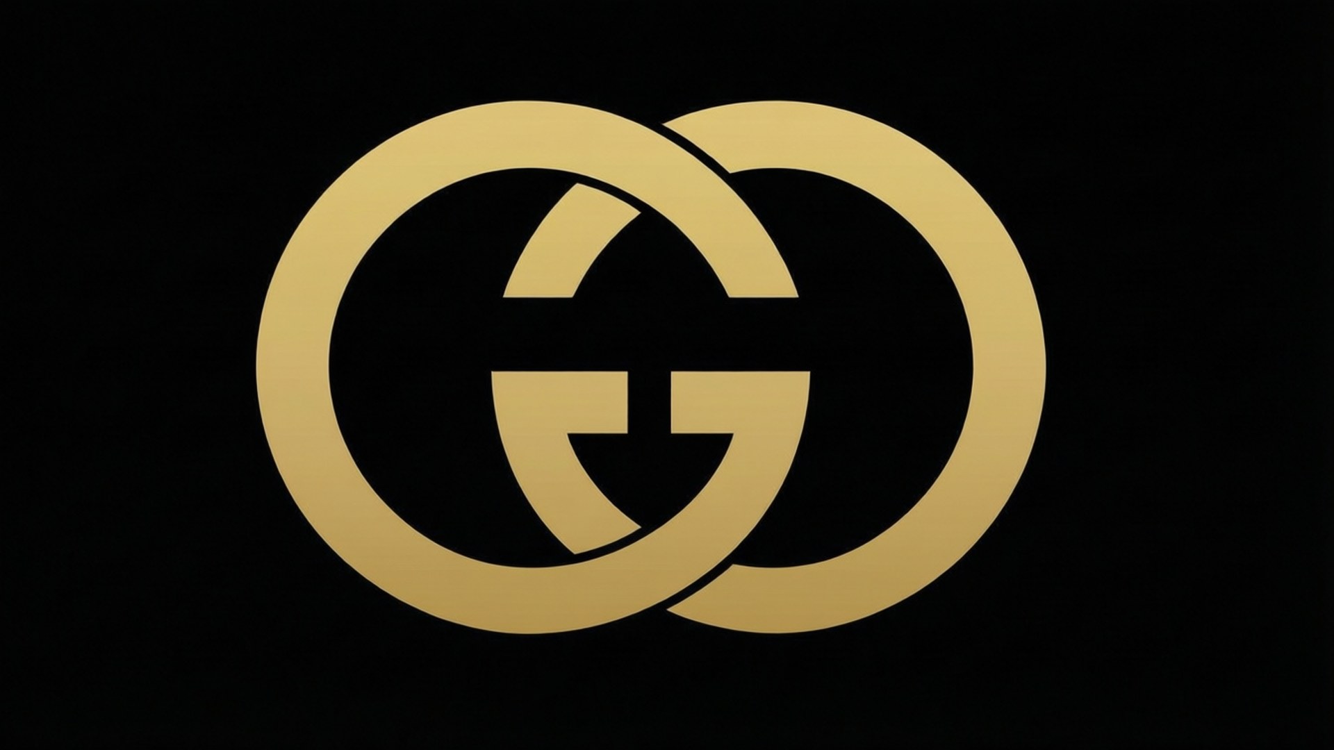 金黑極簡Gucci標誌 壁紙 — 閃亮的金色 Gucci 標誌，帶有交織的 G，在純黑色背景上脫穎而出。