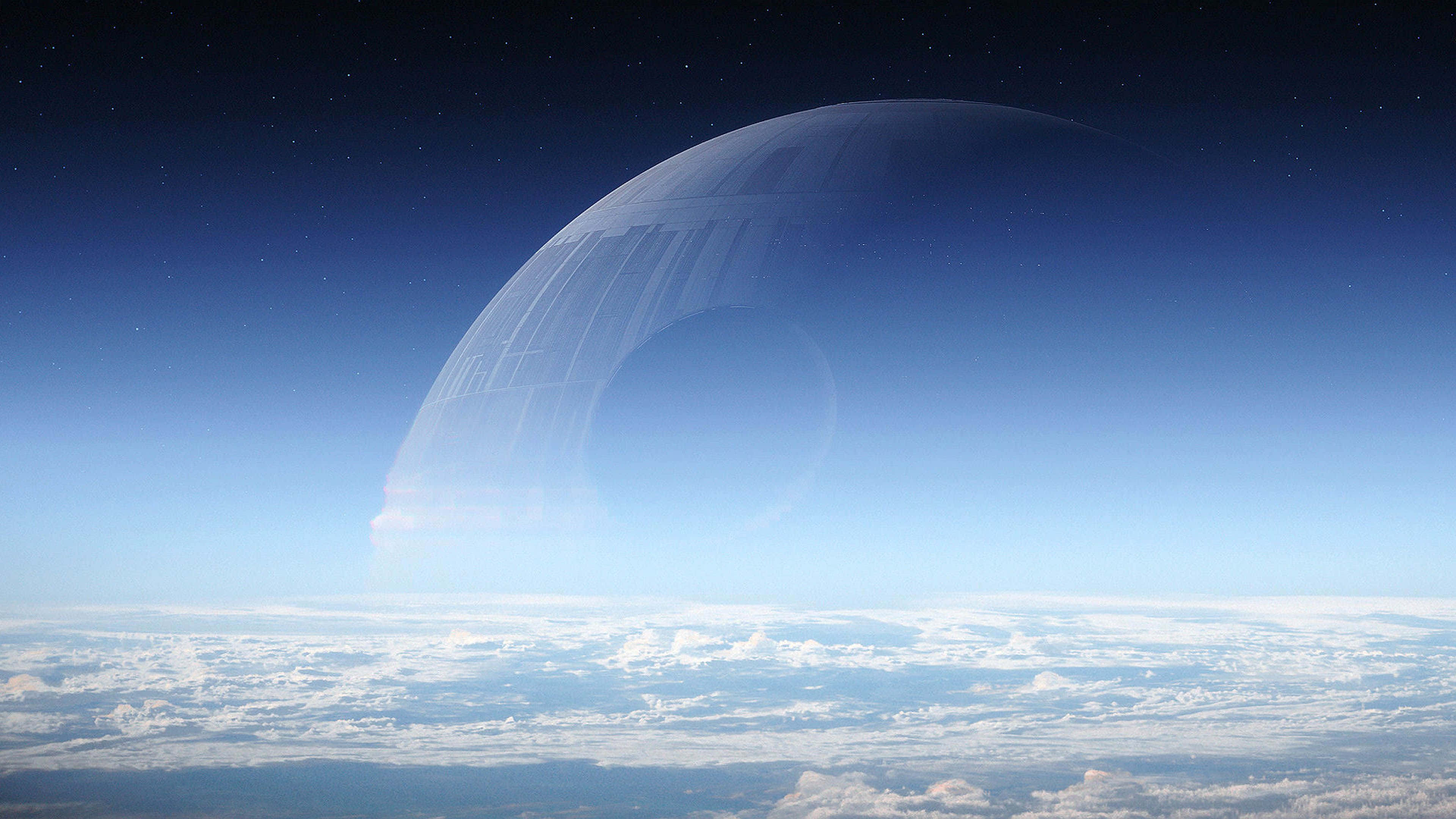 銀河帝國的致命武器——死星 壁紙 — 巨大的死星在星空下籠罩著行星的雲層。