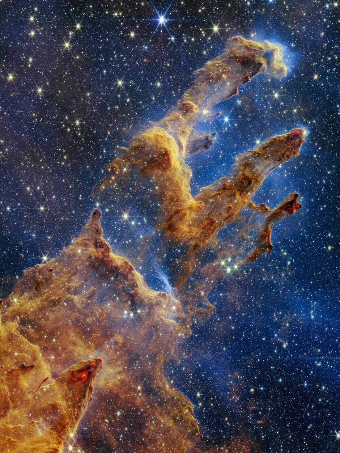 銀河柱天文圖像 壁紙 — 宏偉的宇宙氣體與塵埃柱，在深藍色星場中由星星照亮。