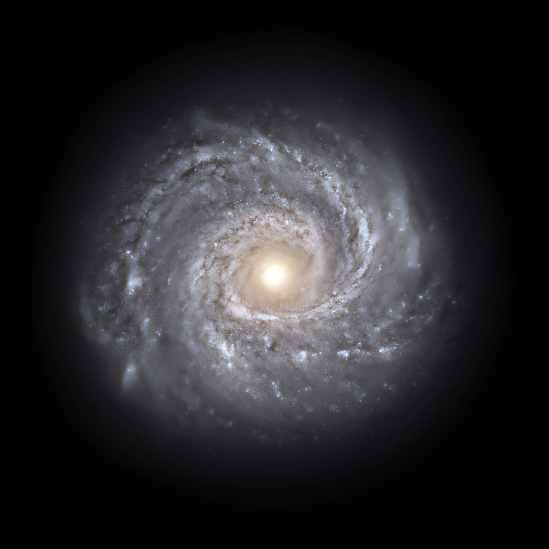 螺旋星系，在深空中擁有明亮的核心和旋轉臂。
