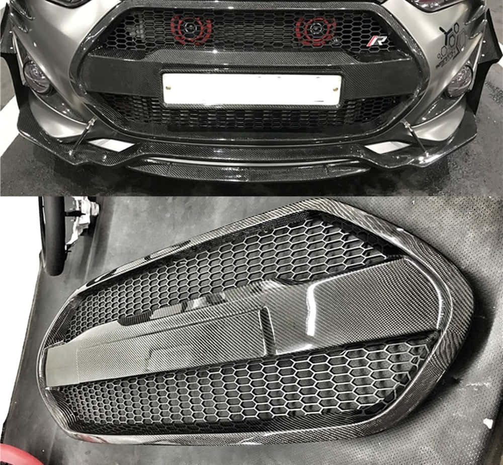 Car Grill 桌布 壁紙 — 銀色汽車碳纖維前保險桿和格柵的特寫，帶有紅色飾邊和六角形網格圖案。