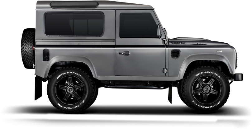 銀色路虎衛士側面視圖 壁紙 — 一台時尚的銀色 Land Rover Defender 側面站立在純黑色背景前，展示其堅固的輪胎和經典的方正設計。