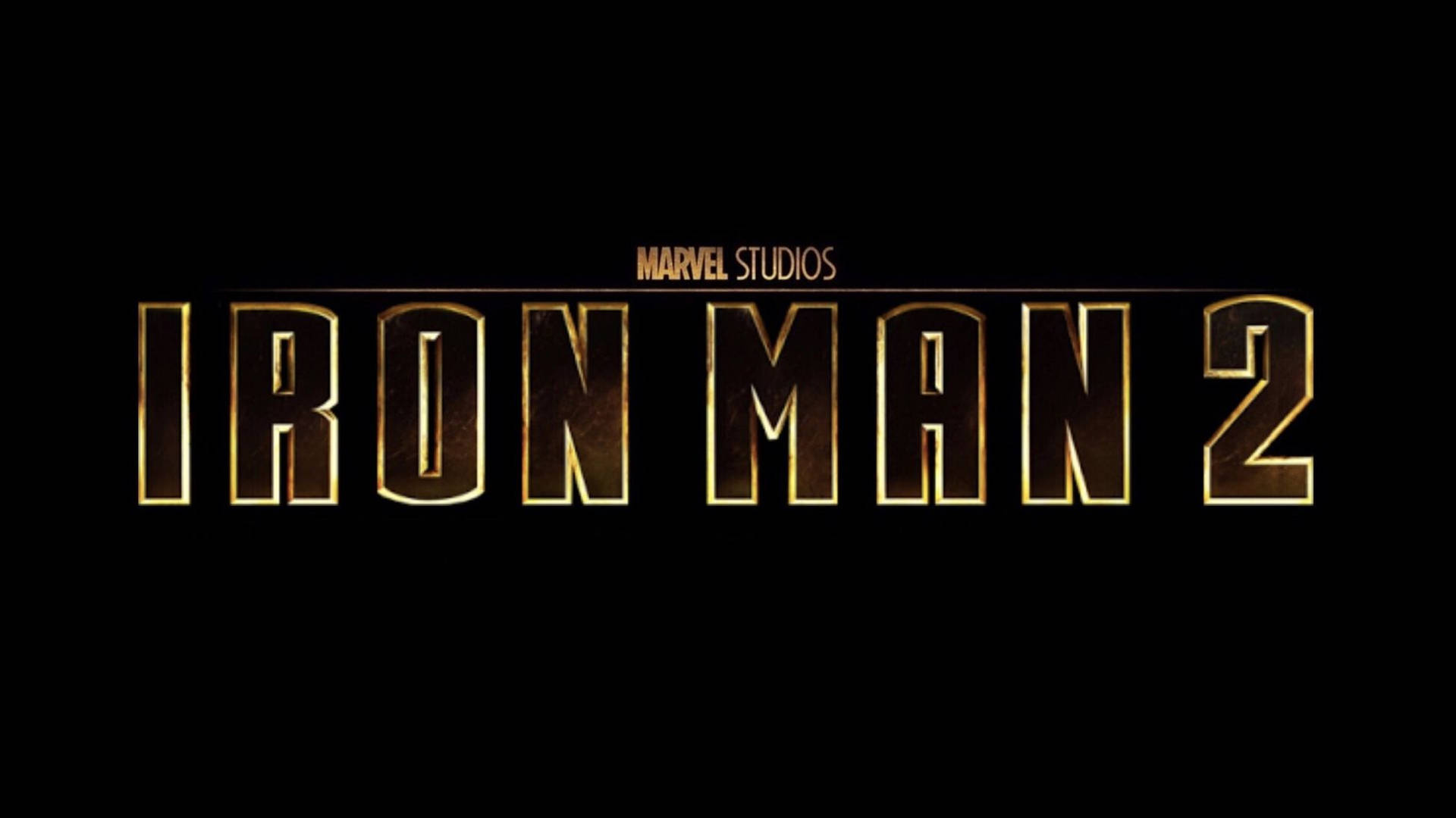 黑色背景上金色鐵甲奇俠2電影標題標誌，附有Marvel Studios文字。