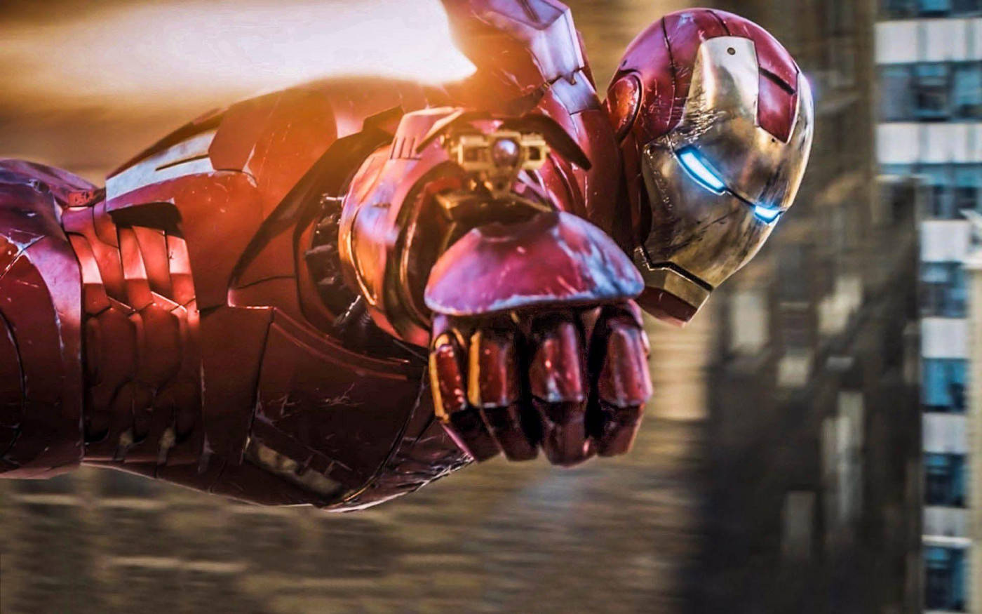 tony stark 桌布 壁紙 — 鐵甲奇俠以發光的衝擊波和堅定的表情飛越城市天際。