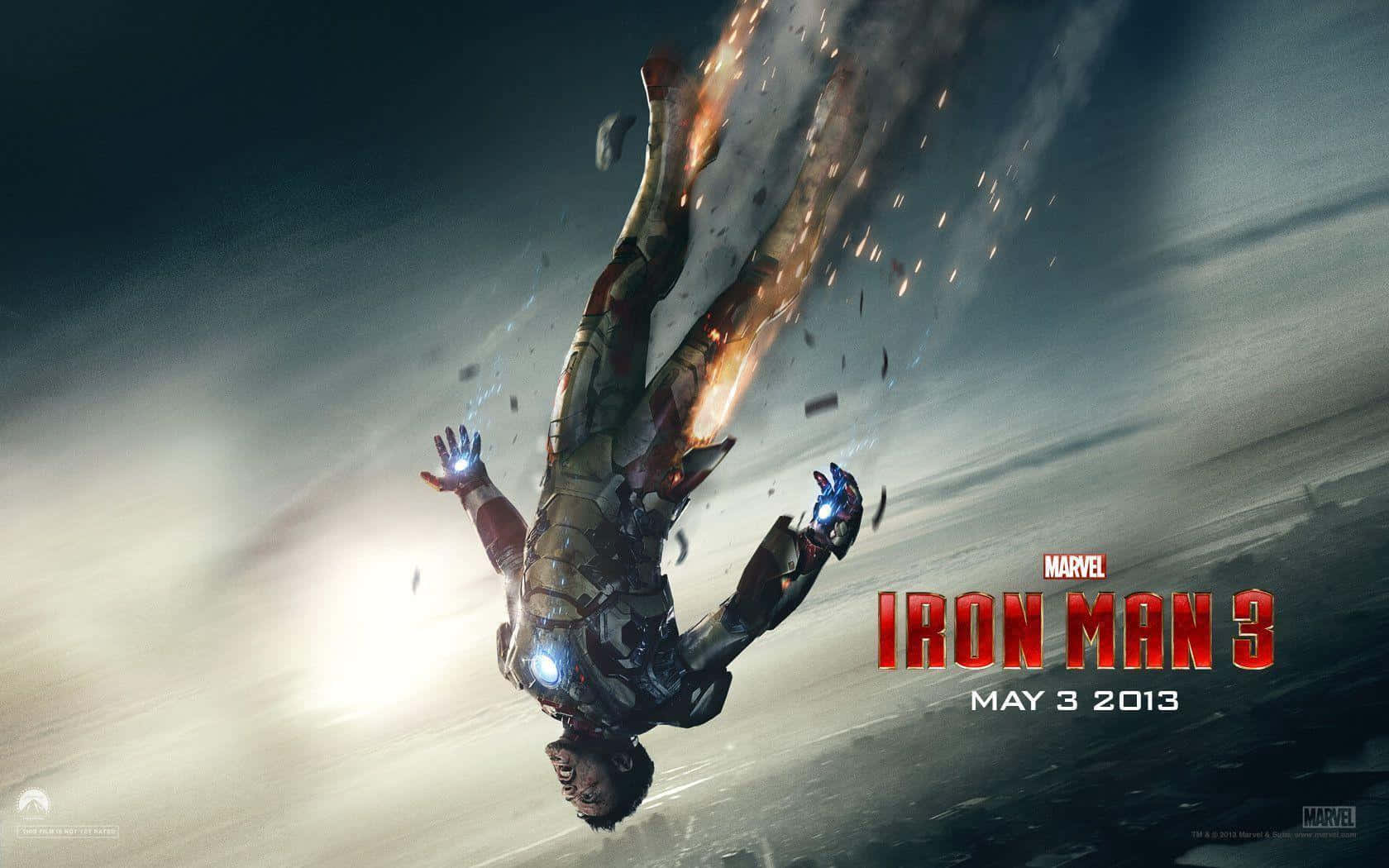 Iron Man Movies 桌布 壁紙 — 鐵甲奇俠在暴風雨中墜落，他的戰衣在明亮的陽光爆發中化為熾熱的火花而解體。