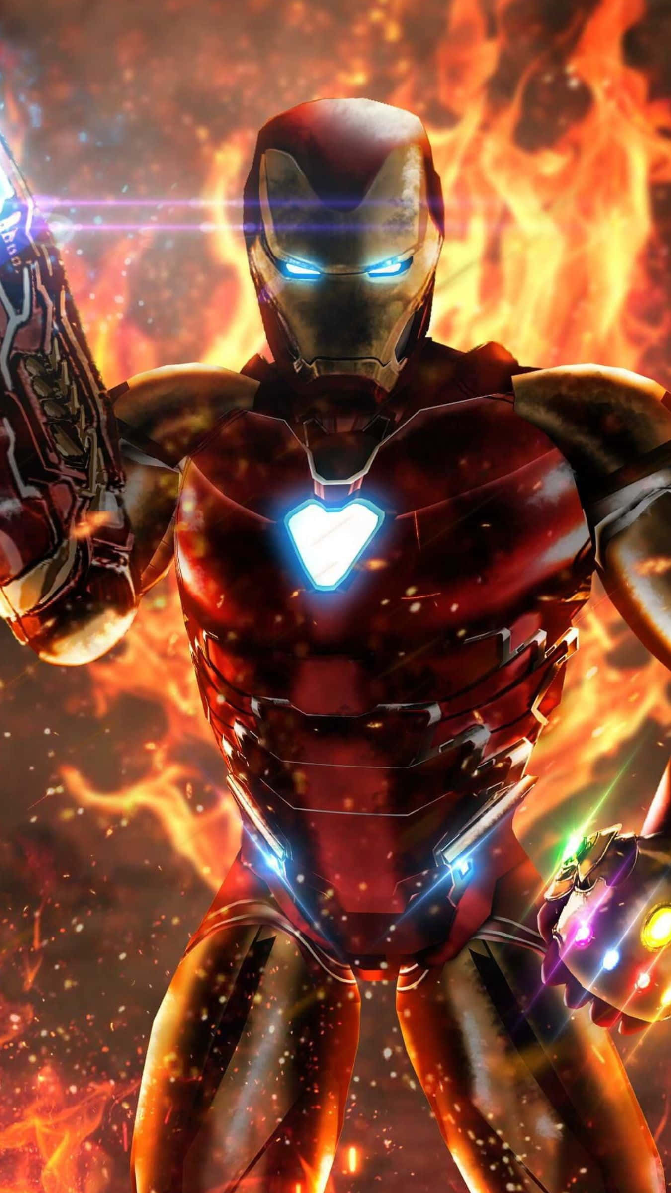 Iron Man Weapons 桌布 壁紙 — 鐵甲奇俠英勇地站在熊熊烈火中，雙眼和胸口弧形反應爐發出藍光。