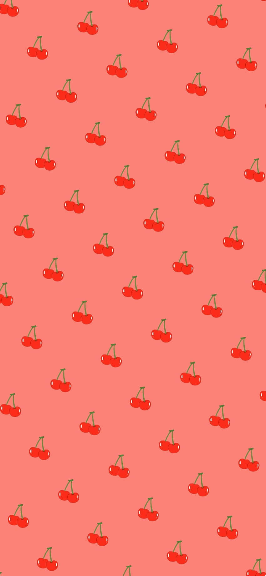 珊瑚色背景上散落著紅色櫻桃插圖。 — 粉紅色 iPhone 壁紙