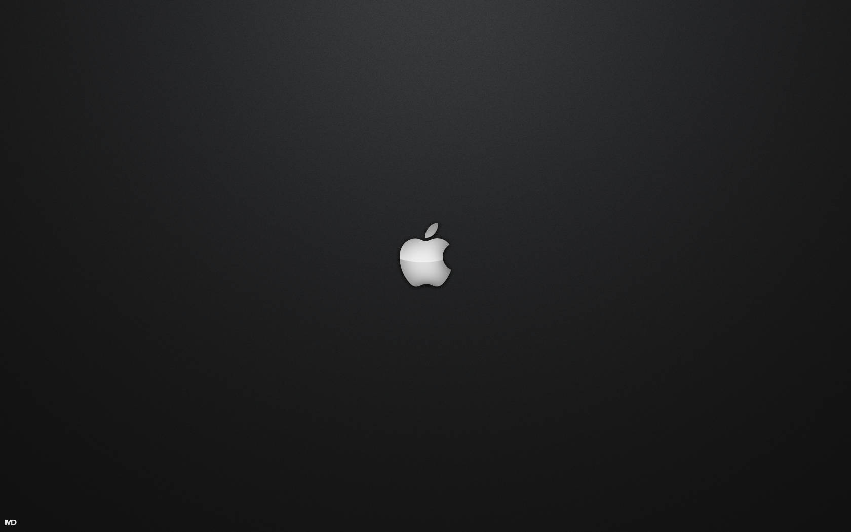 深色漸變背景上的銀色Apple標誌
