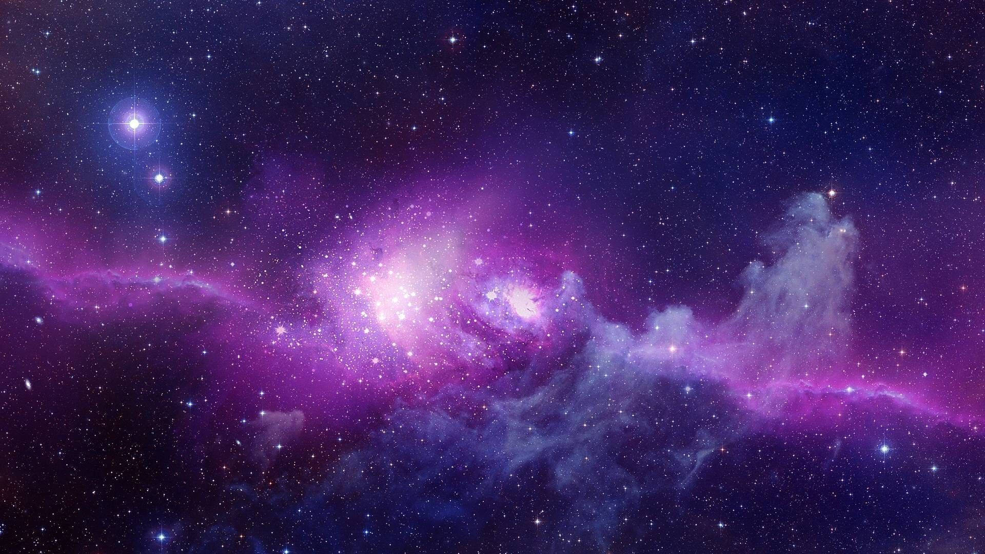 閃爍可愛星際 壁紙 — 令人嘆為觀止的景色，一個充滿活力的紫色和藍色星雲，在深邃的宇宙夜空中閃爍著星星。