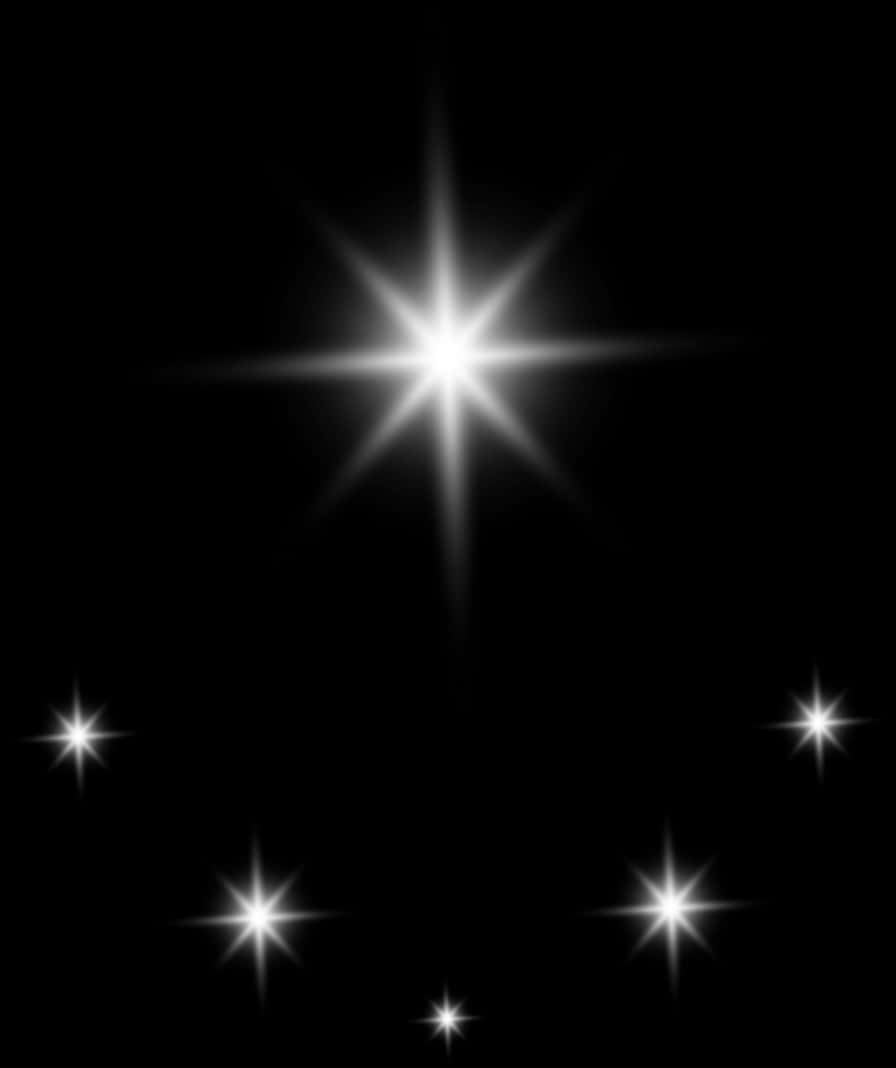 閃爍星辰夜空 壁紙 — 一個燦爛的星爆在深邃的黑色虛空中明亮閃耀，周圍散佈著較小的星星。