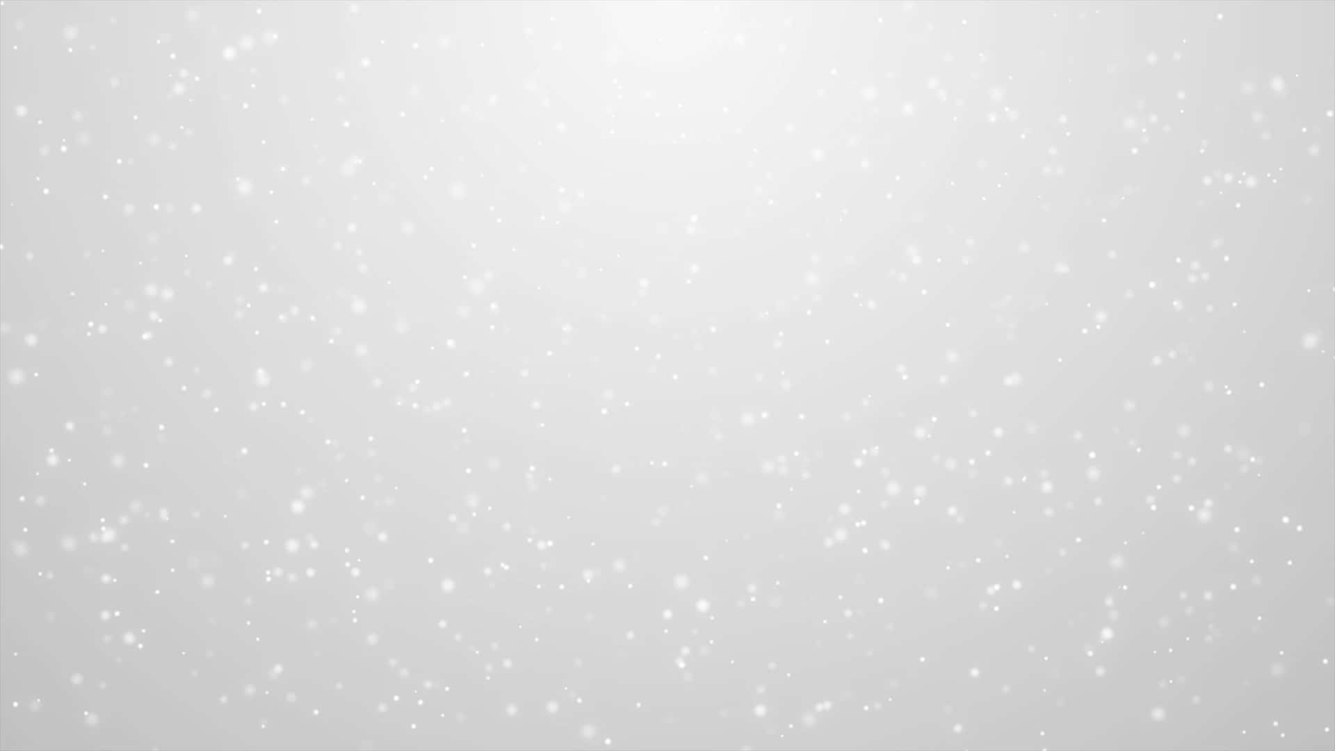 雪花在明亮的冬季場景中輕輕飄落。