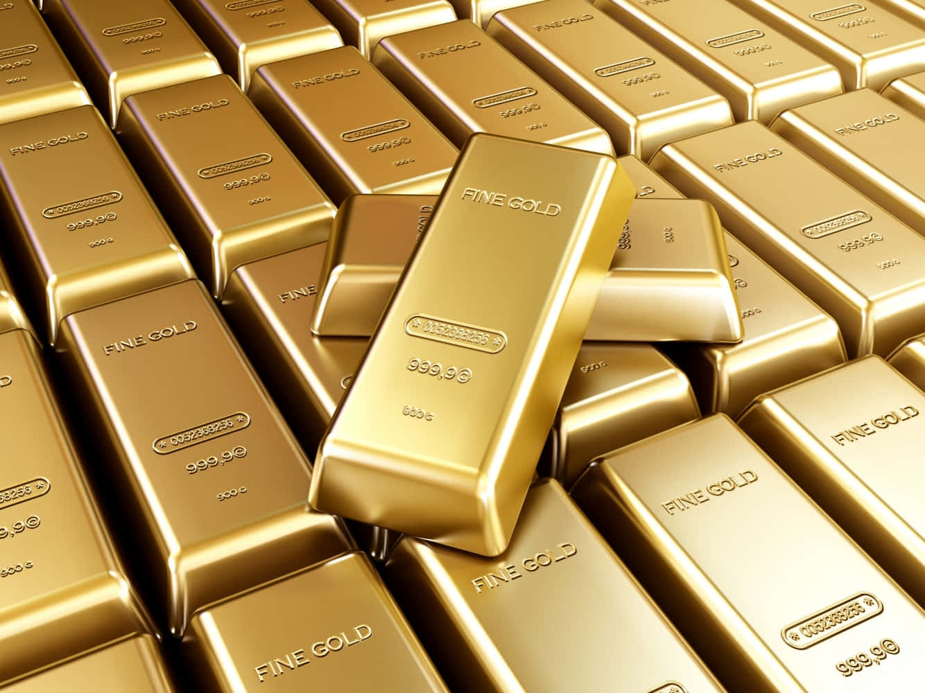 閃耀的金屬彈珠 壁紙 — 閃閃發光的金條，標示為純度999.9的純金，緊密堆疊成閃亮的一堆。