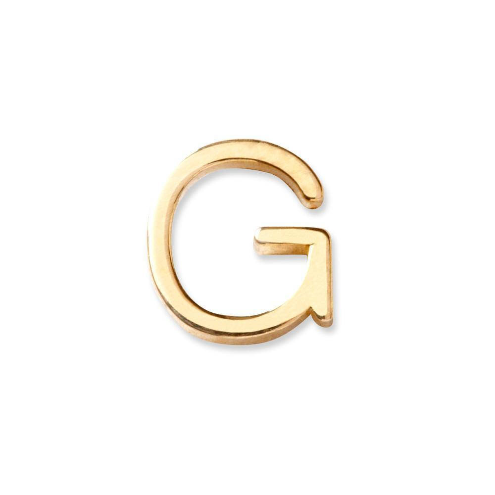 潔白背景上的拋光金色字母G吊飾