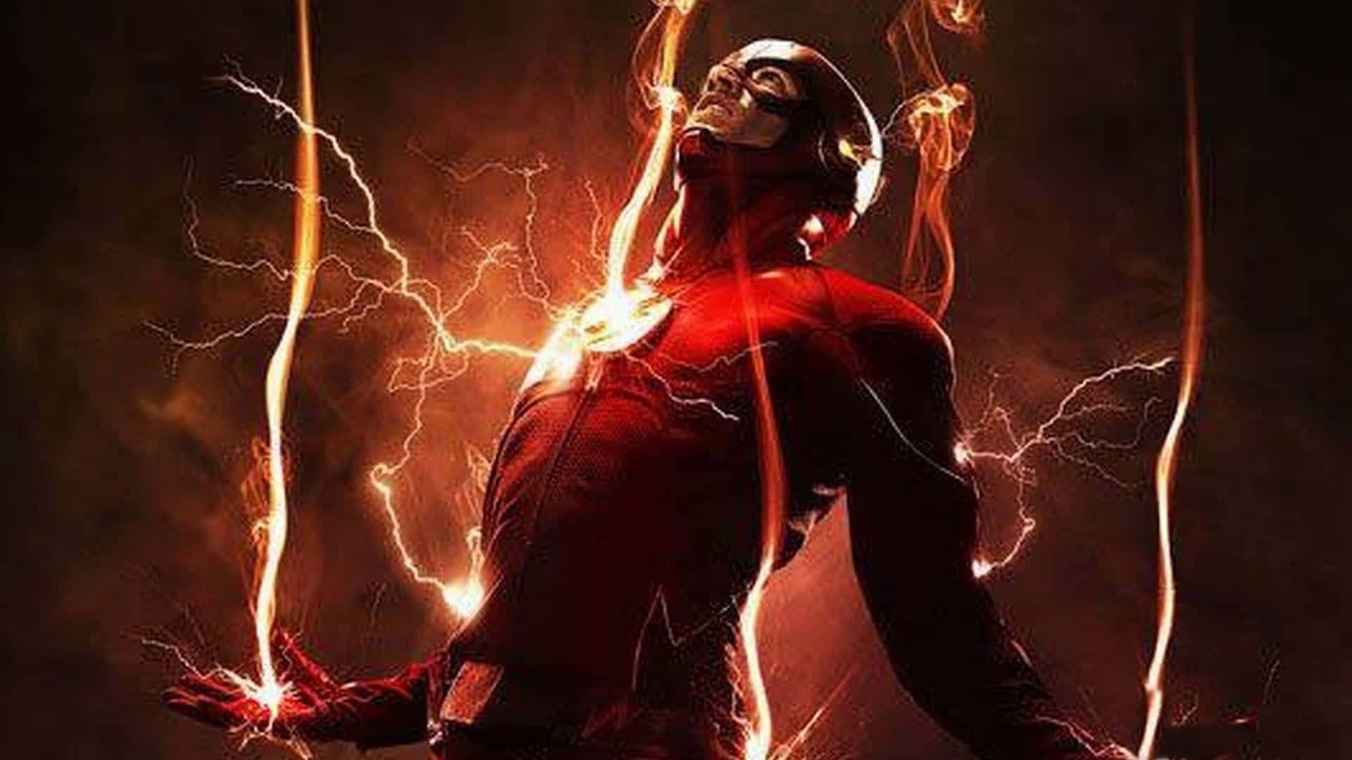 閃電俠蓄勢待發 壁紙 — The Flash 站在黑暗的暴風雨中，閃電在他紅色戰衣和發光的胸口標誌周圍噼啪作響。