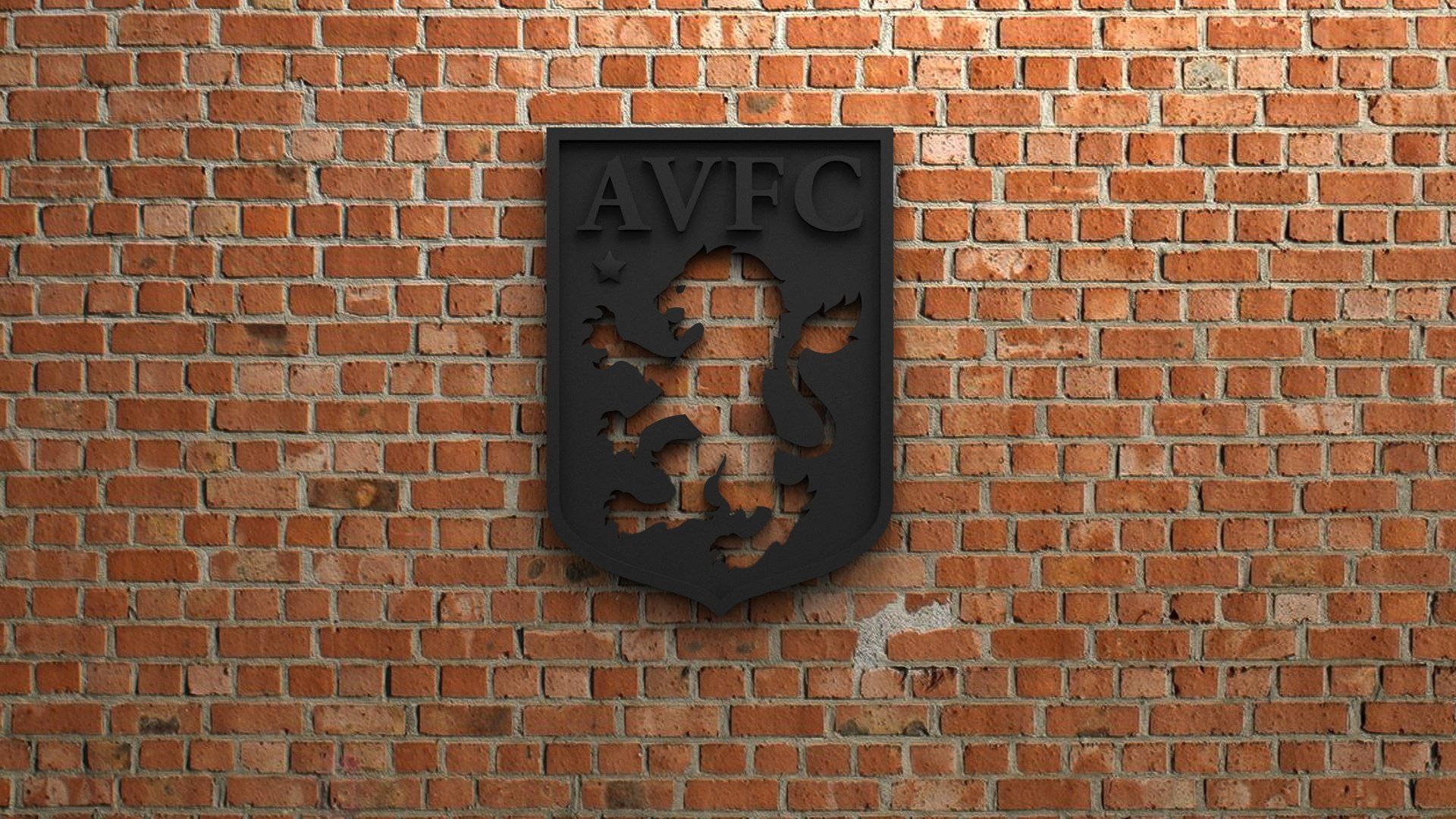 阿士東維拉足球俱樂部 鐵牆設計 壁紙 — 一個黑色AVFC徽章，帶有獅子標誌，安裝在紋理紅磚牆上。