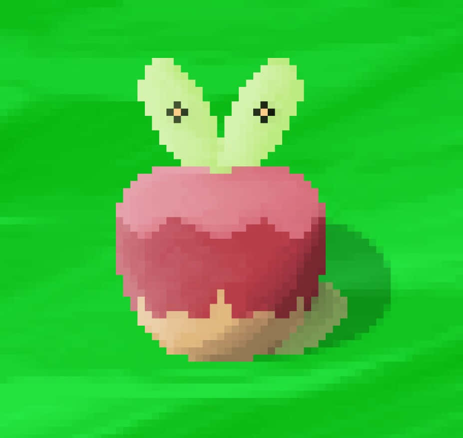 像素化紅蘋果角色，有葉子耳朵和鬥雞眼，在綠色草地上。