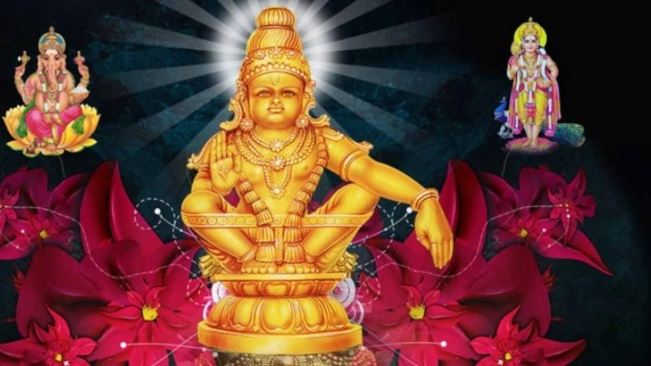 金色印度教神像被紅花和漂浮的神聖人物環繞。