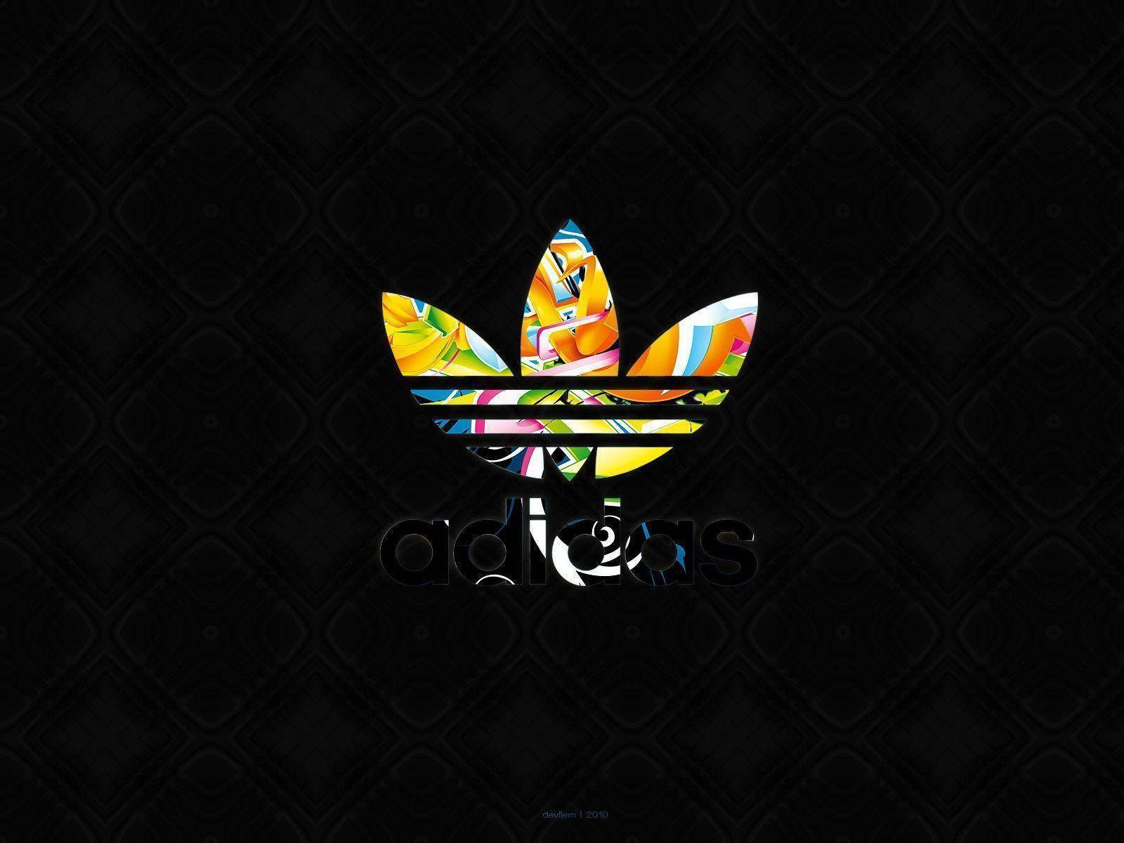深色紋理背景上的色彩繽紛抽象Adidas標誌