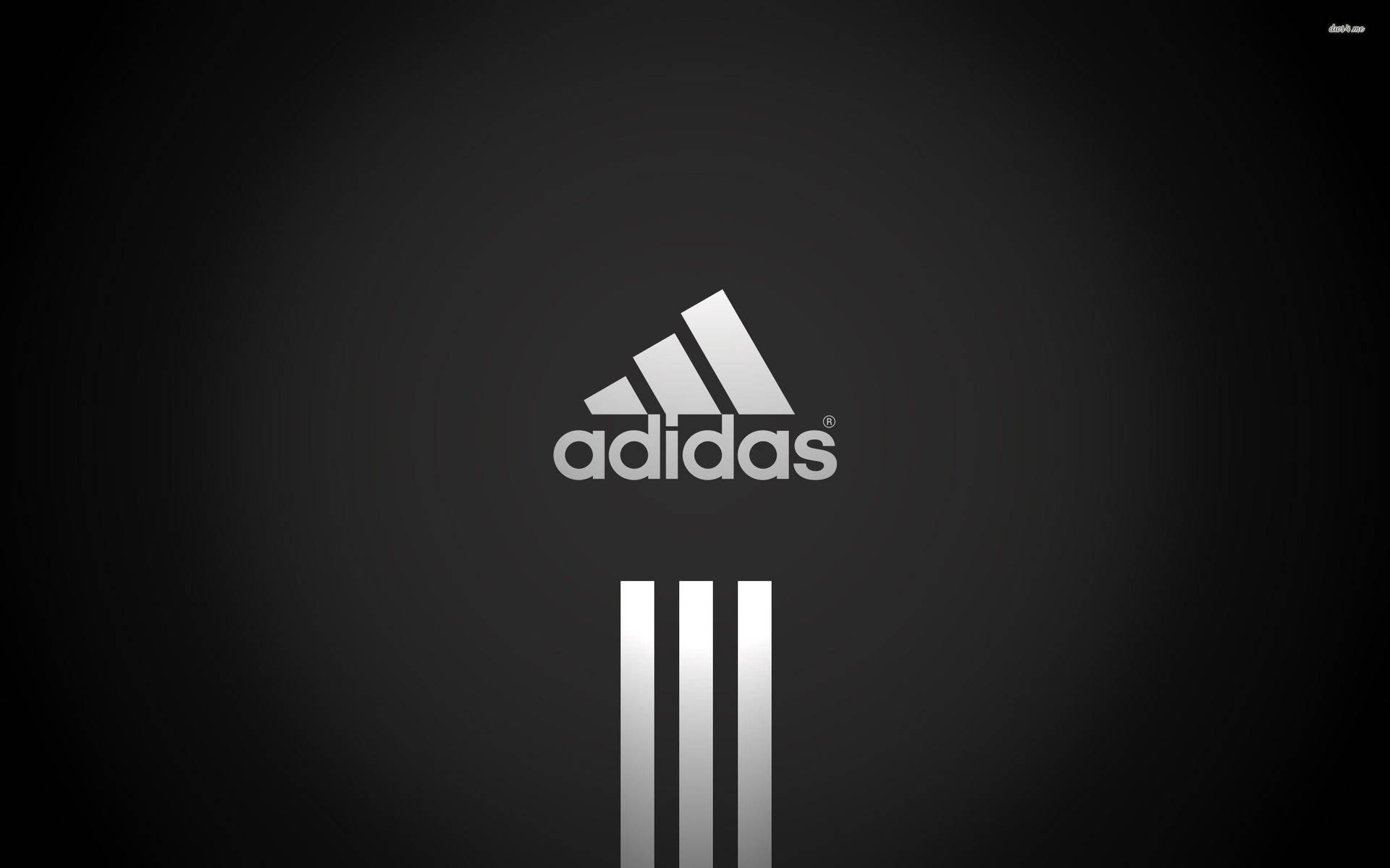 黑色背景上帶有三條紋的Adidas標誌