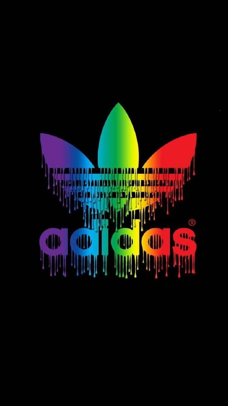 黑色背景上滴落的彩虹 adidas 標誌