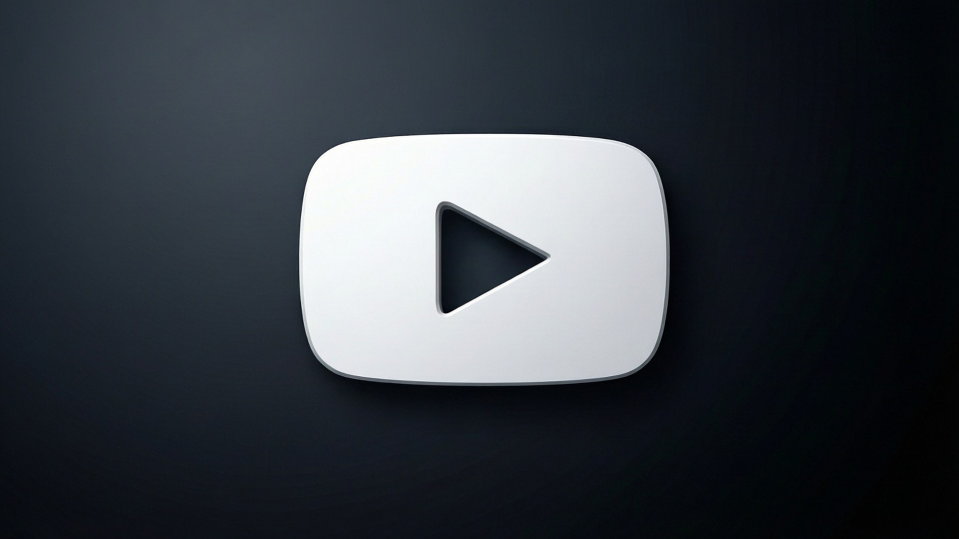 陰影Logo漸層背景 壁紙 — 一個時尚的白色YouTube播放按鈕圖標，居中於深色漸變背景上，帶有柔和照明。