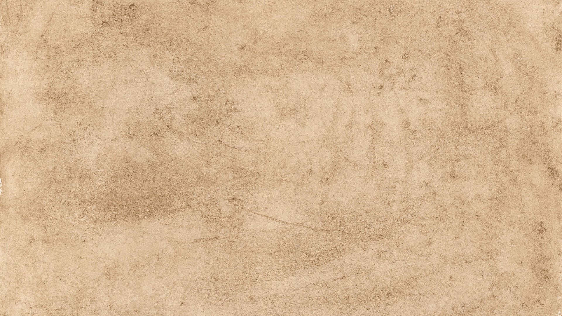 Old Paper Texture 桌布 壁紙 — 陳年米色羊皮紙的特寫，帶有細微污漬和紋理表面。
