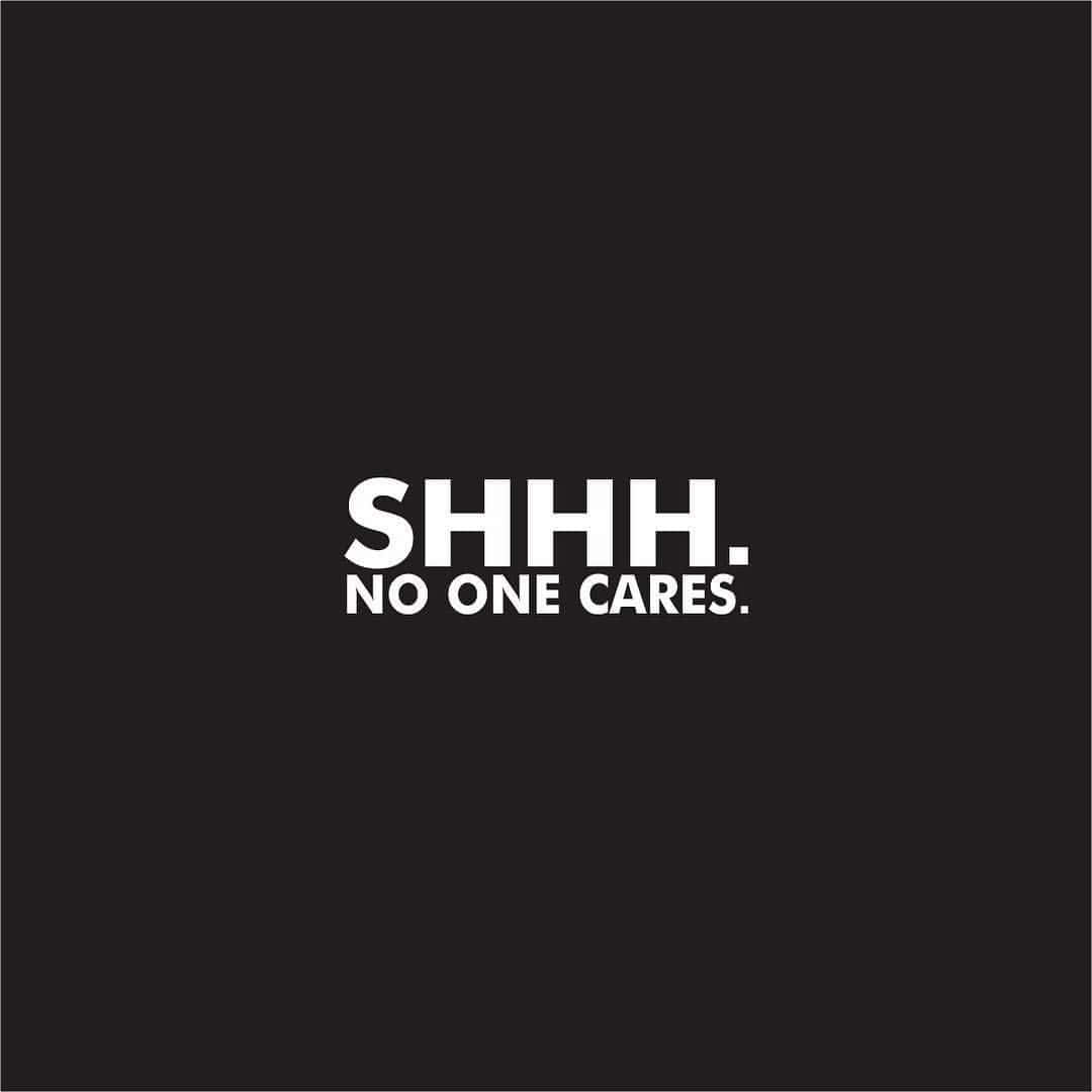 黑色背景上寫著 SHHH NO ONE CARES 的粗體白色文字。