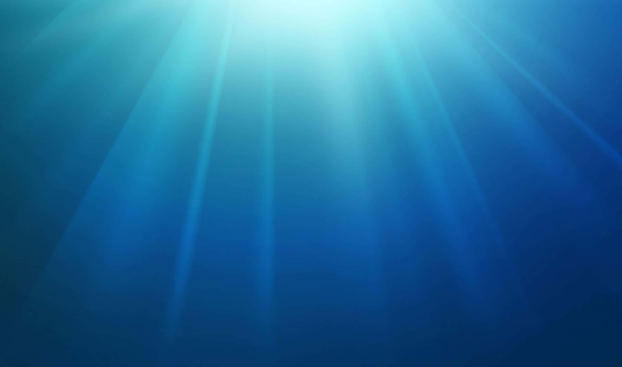 2440x1440 桌布 壁紙 — 陽光穿透深藍色海水，形成綠松石色和天藍色的耀眼條紋。