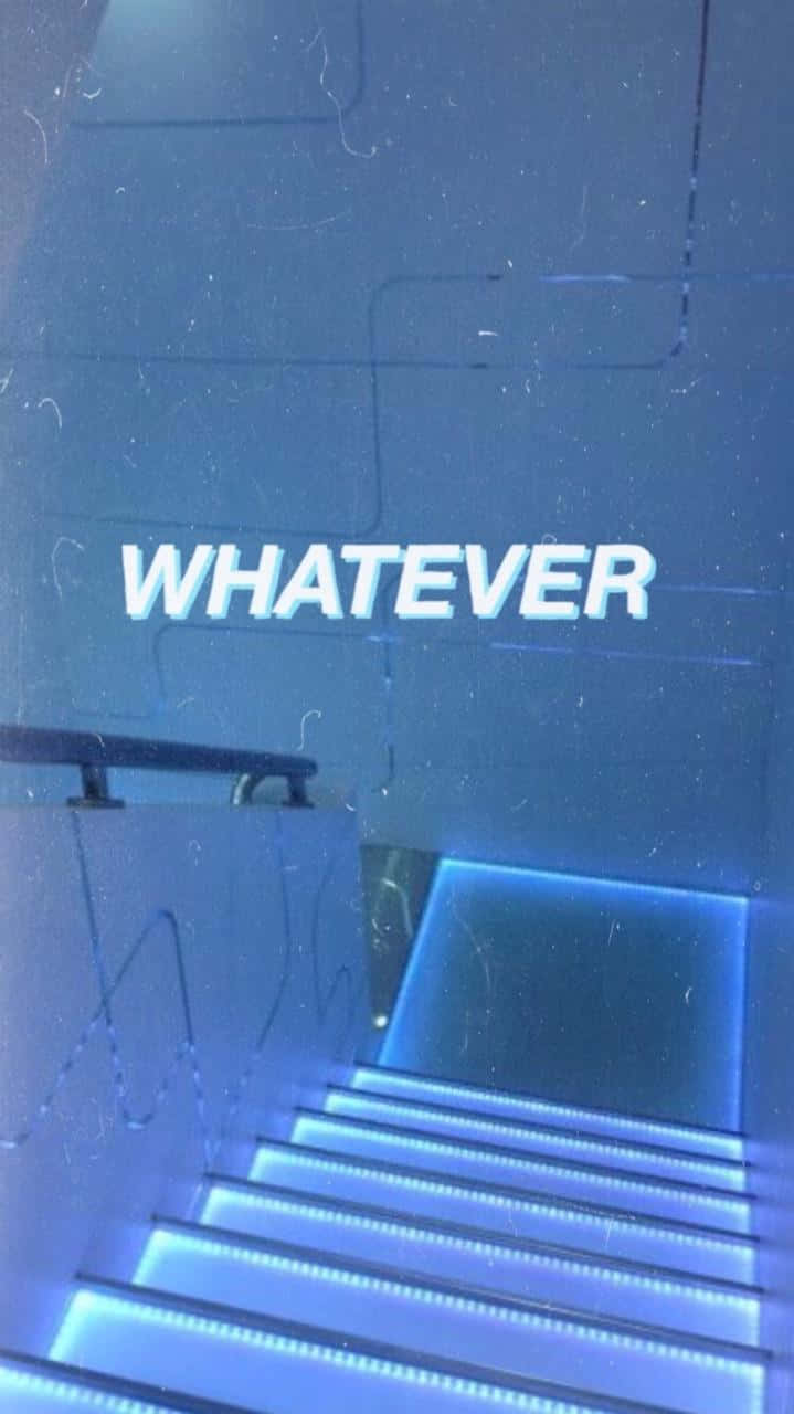 現代工業風格中，藍色燈光樓梯，牆上帶有「WHATEVER」文字。