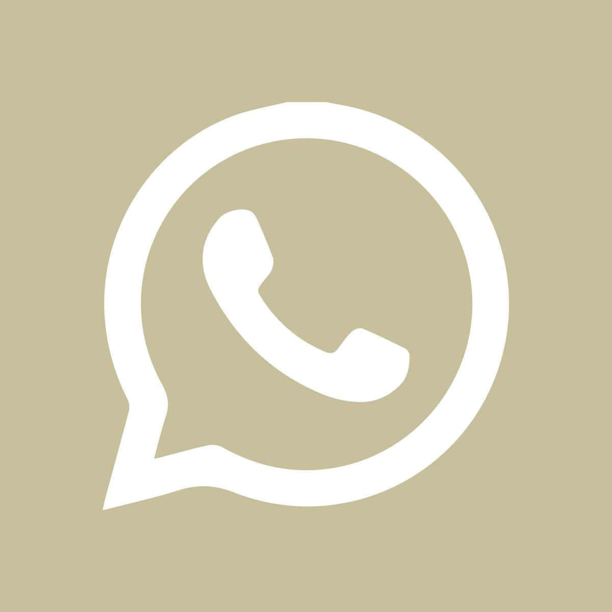 米色背景上的白色WhatsApp標誌