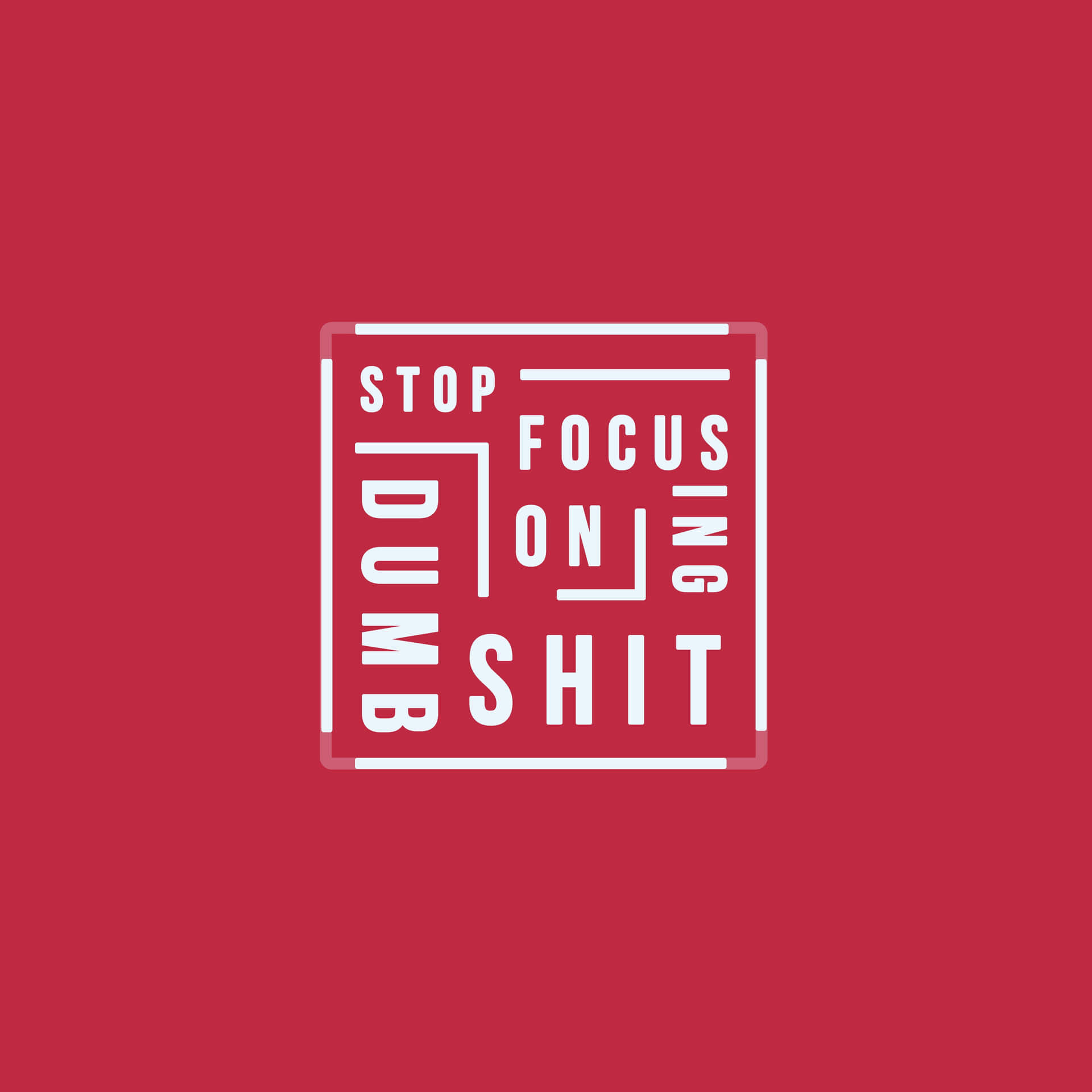 紅色背景，幾何圖案框架內有白色文字寫著 stop focusing dumb shit。