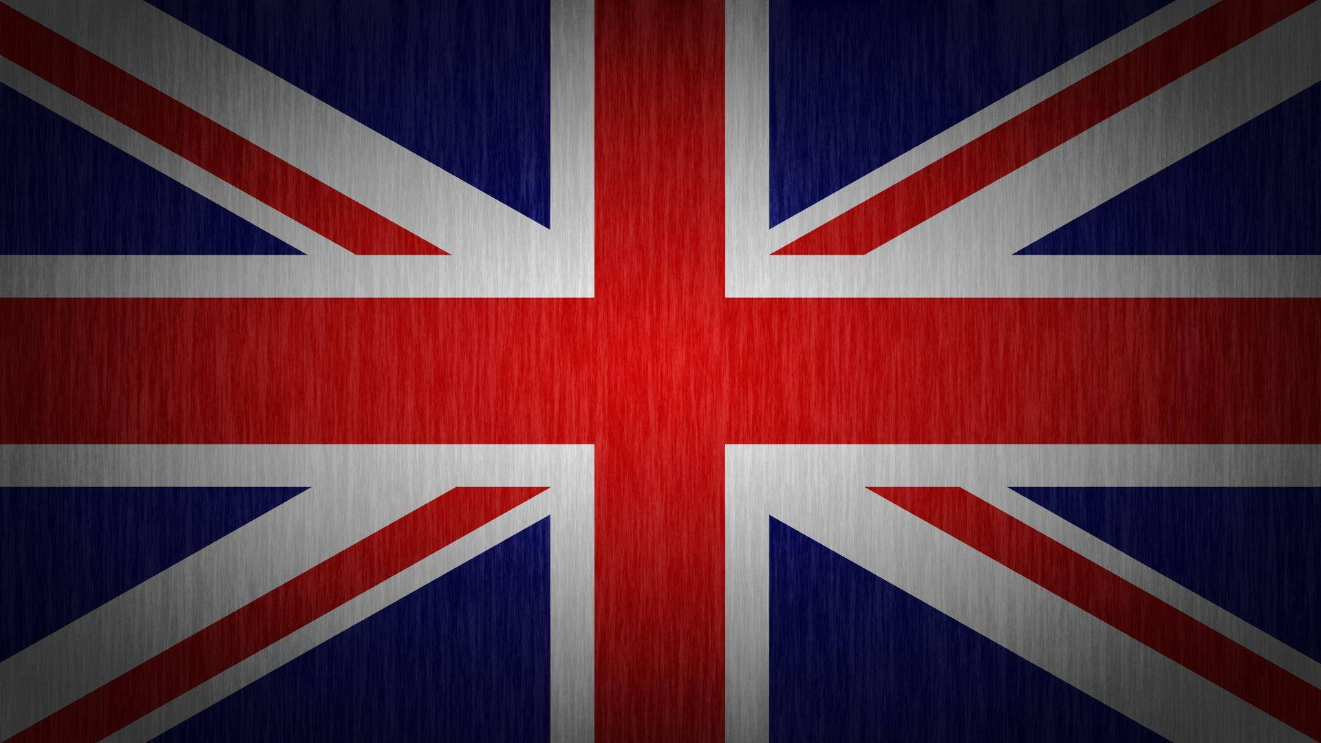 雄偉的聯合旗幟——英國國旗高畫質影像 壁紙 — 帶有拉絲金屬紋理的英國國旗，顯示紅、白、藍條紋和十字。