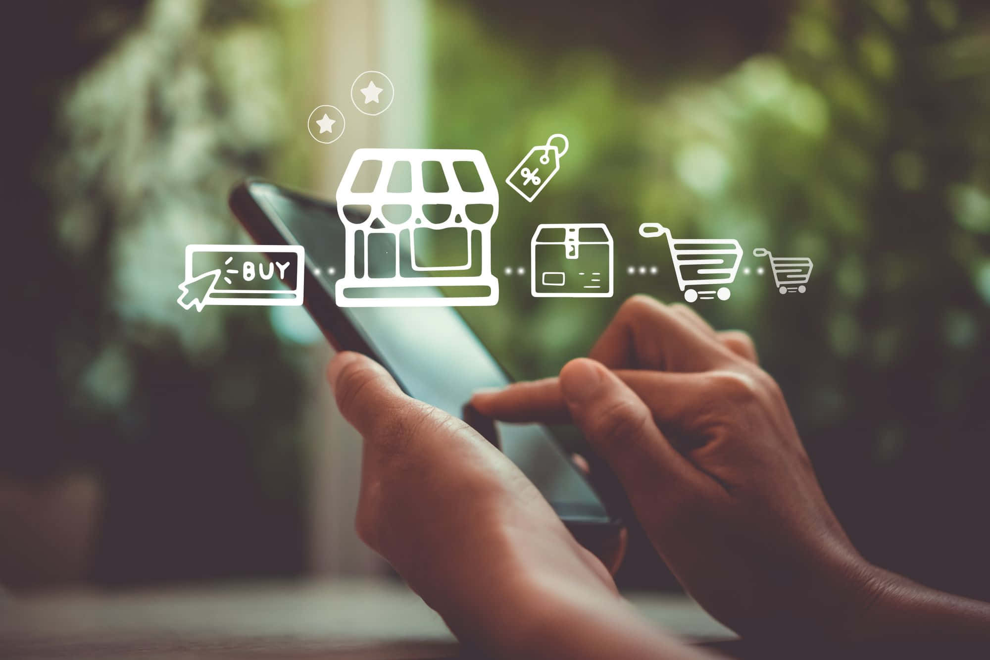 E Commerce 桌布 壁紙 — 雙手握住智能手機，顯示浮動的白色圖標，代表網上購物和電子商務交易。