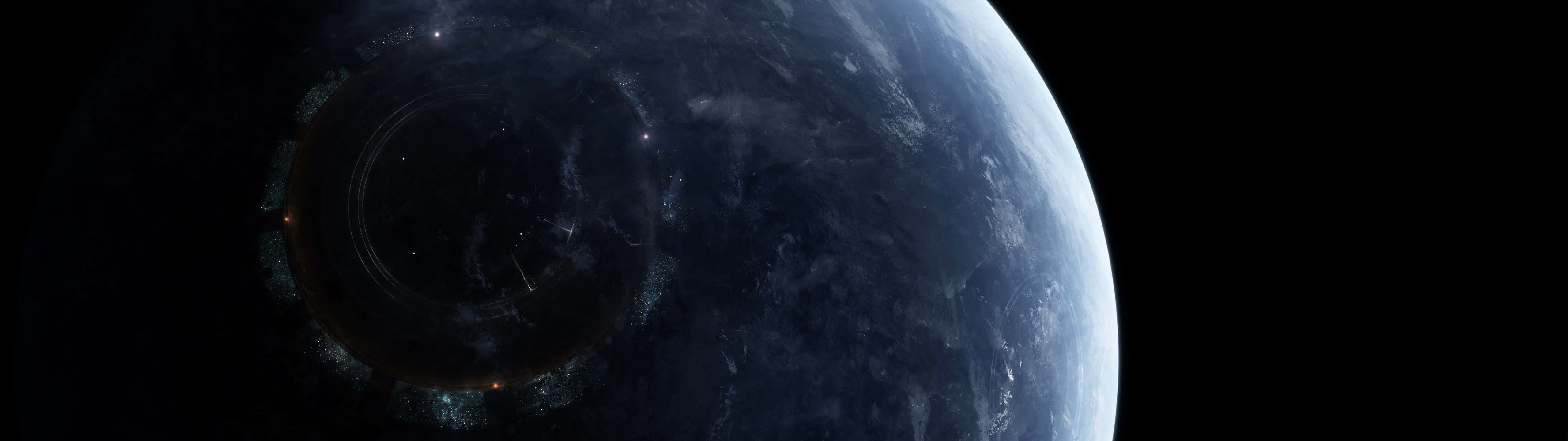 黑暗太空中一顆帶有發光帶的巨型環狀行星。