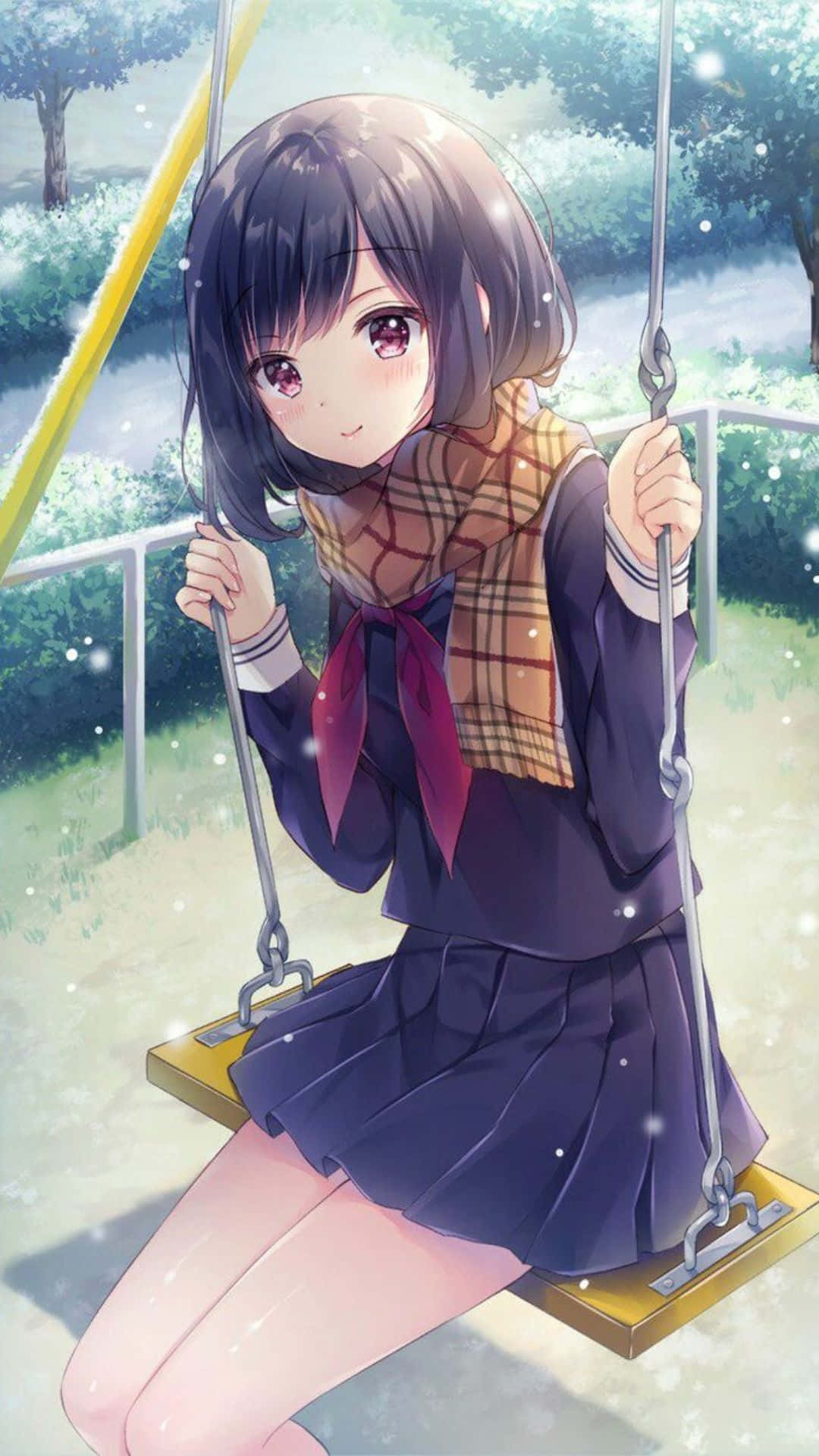 下雪天穿著校服的動漫女孩在鞦韆上