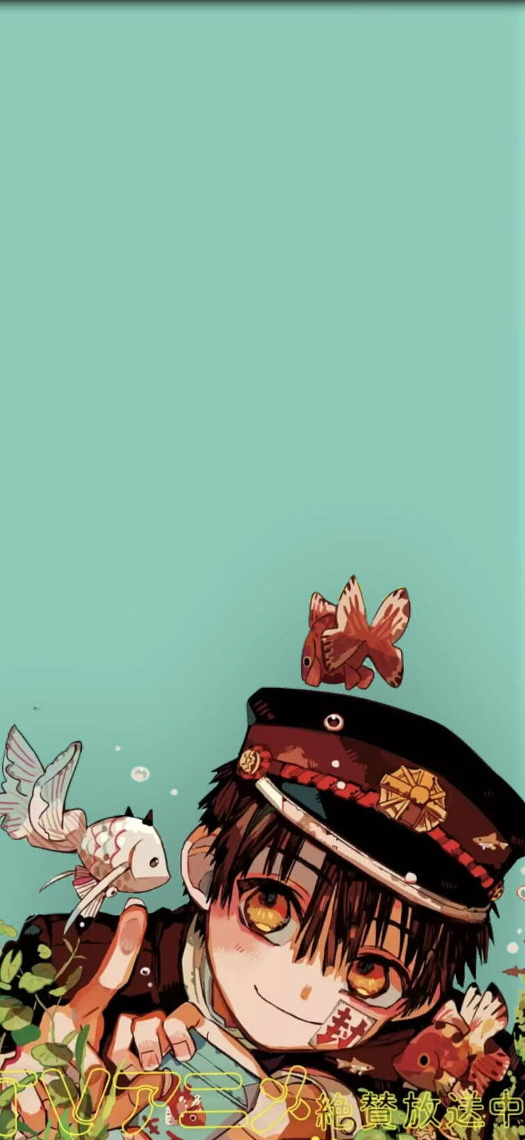 雪乃君與魚群共舞 壁紙 — 一個開心的動畫男孩戴著水手帽微笑，魚兒在他周圍游動，背景是青綠色。
