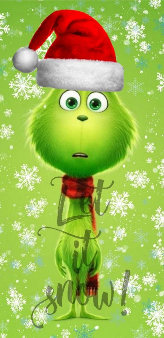 雪片中的嬰兒格林奇 壁紙 — 鬼靈精戴着紅色聖誕帽和紅色圍巾，背景為綠色，帶有白色雪花和草書文字「Let it snow!」