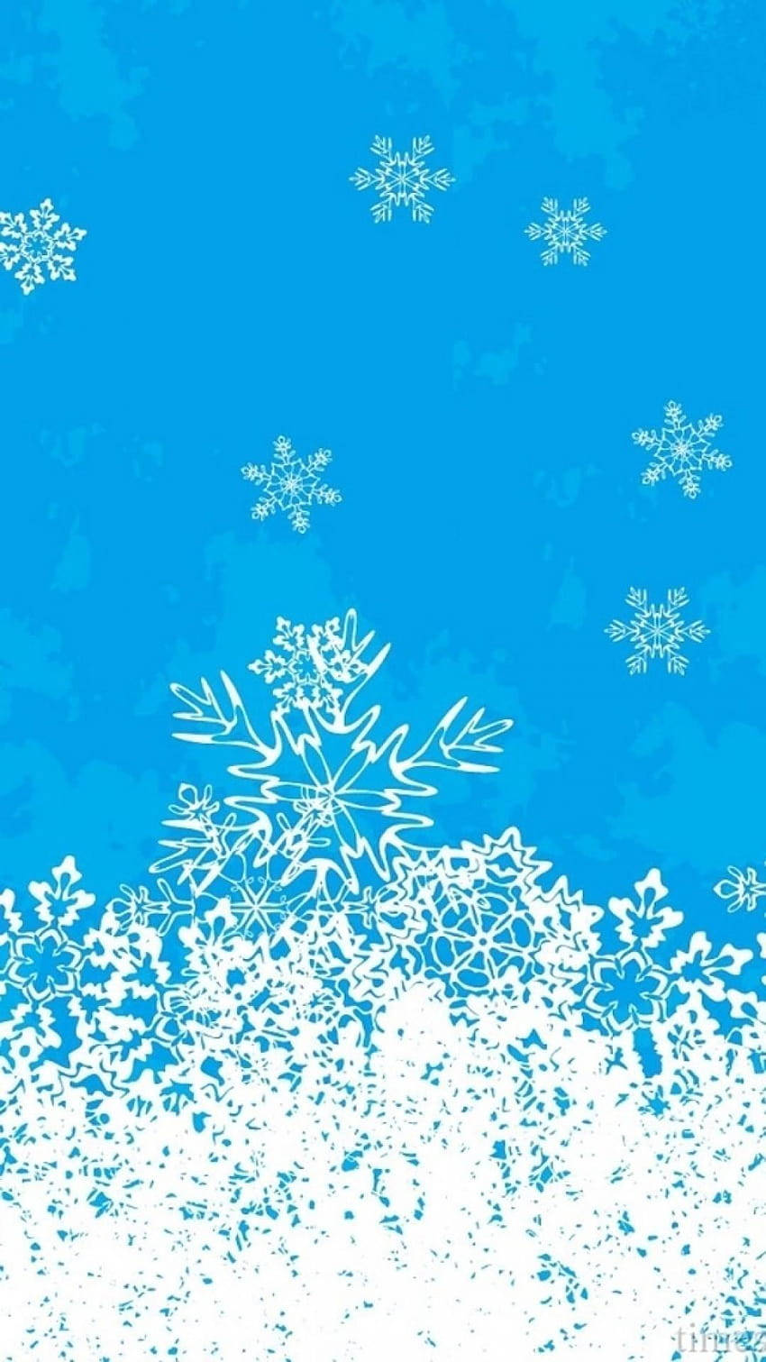 雪花飄落在帶有紋理的藍色背景上。