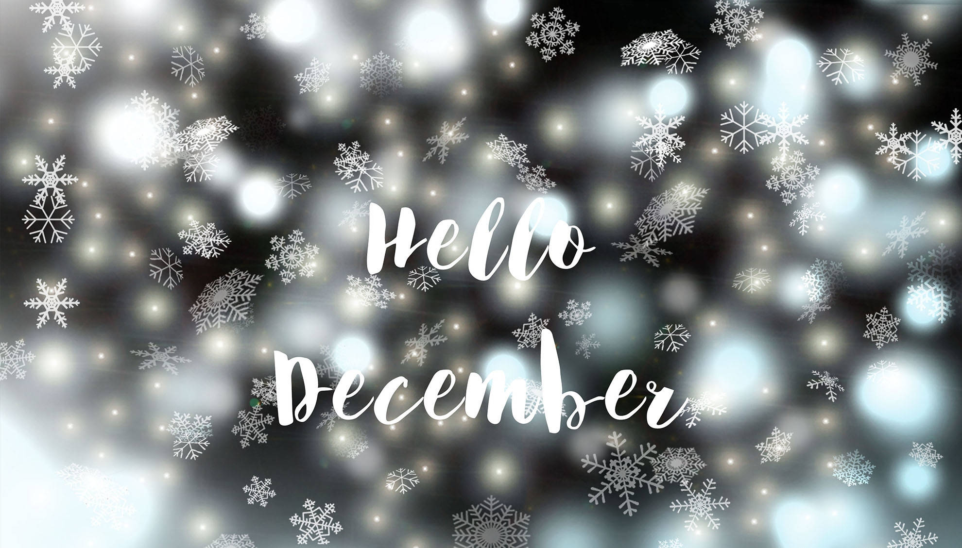 雪花裝飾的「Hello December」問候橫幅 壁紙 — 白色雪花在帶有發光燈光和草書文字 hello december 的散景背景上飄動。