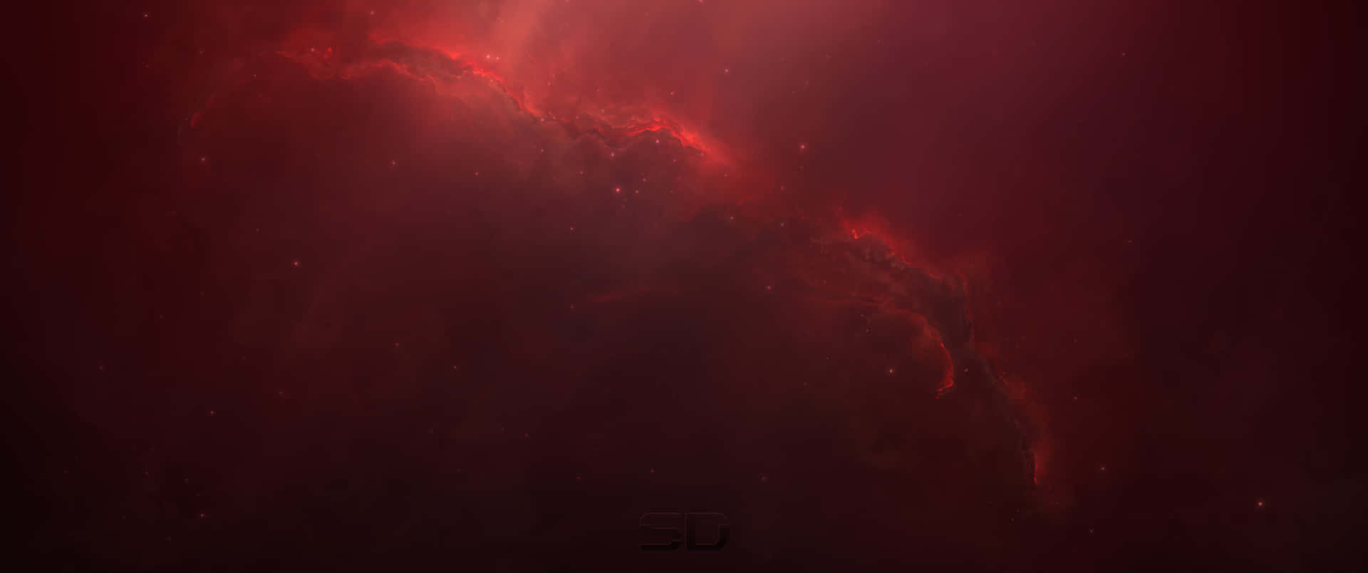 深空中散佈著星星的發光紅色星雲。