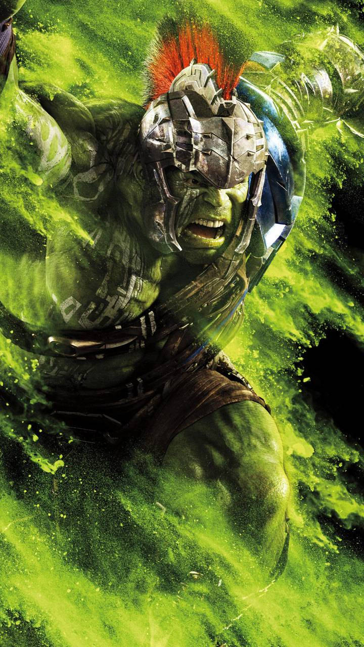 變形俠醫穿著盔甲咆哮，伴隨著綠色能量爆炸