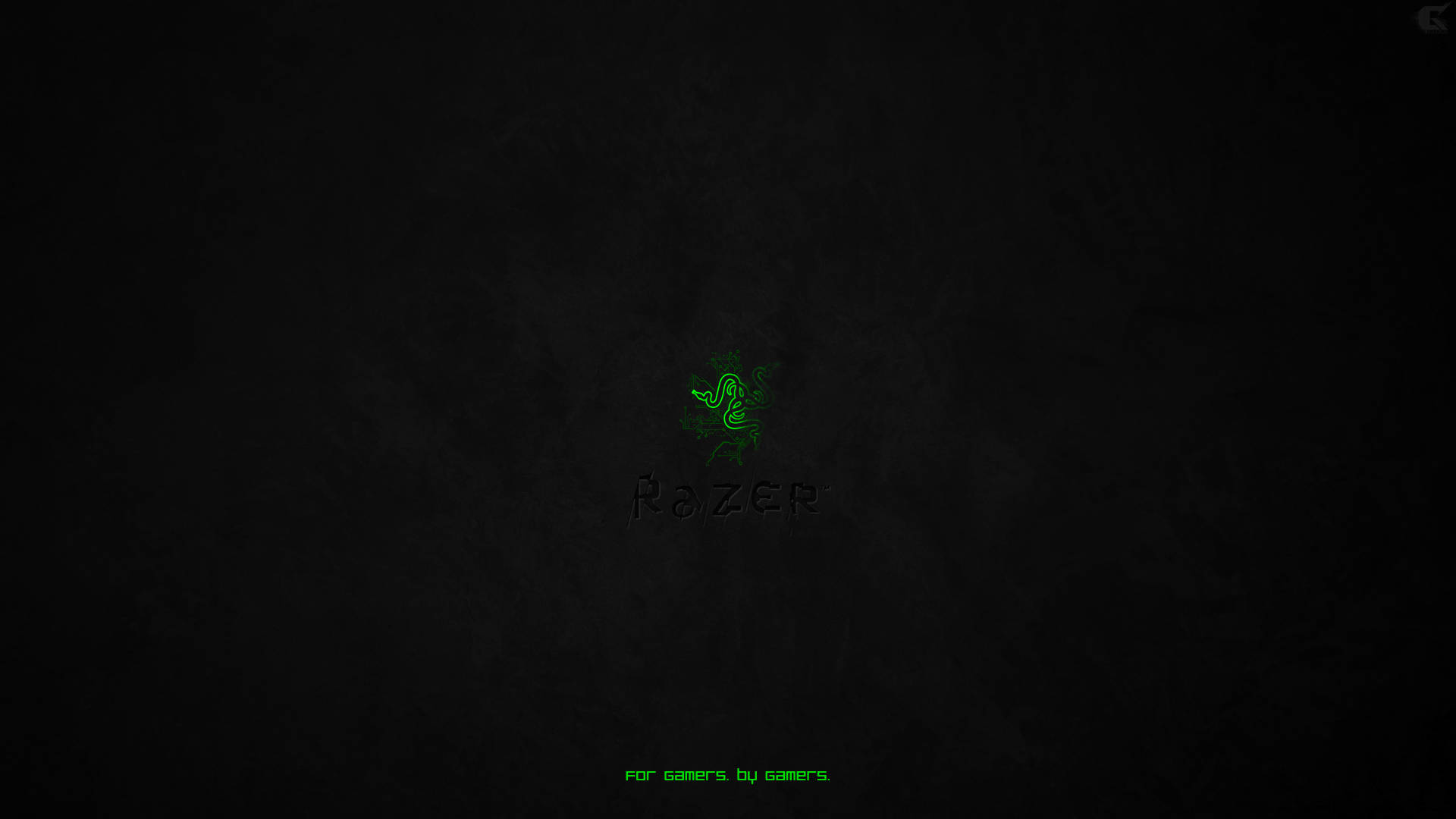 Razer標誌在深色紋理背景上發出綠光，附有為玩家而設的標語。